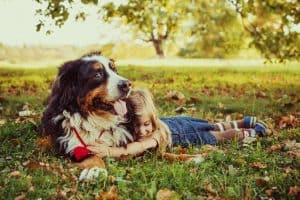 little girl with dog