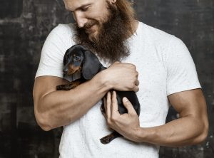 bearded man and dog