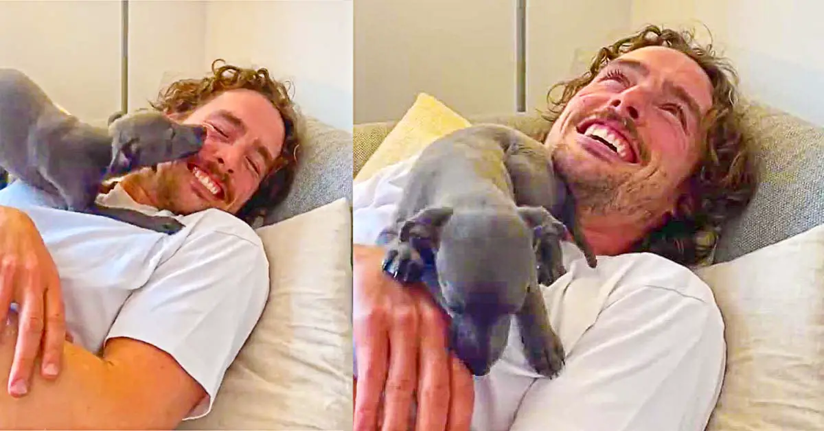 man meets first puppy