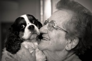 old woman and dog