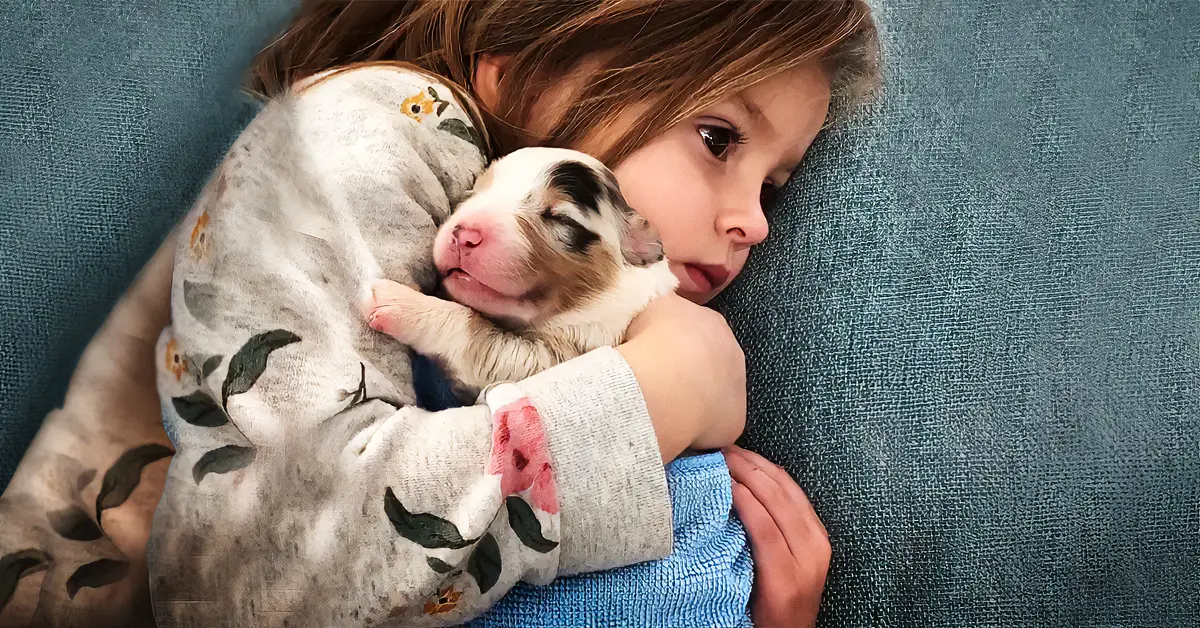 girl and puppy