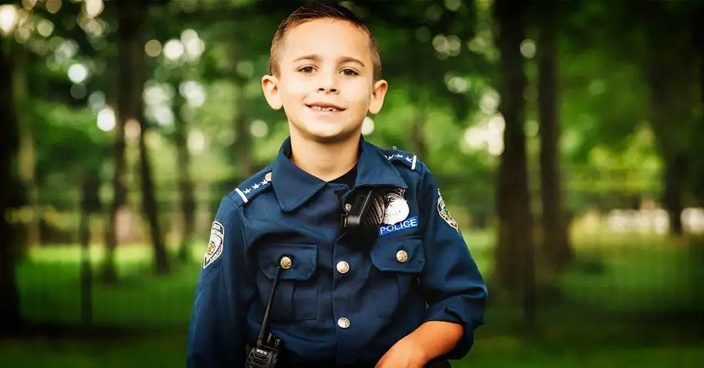 boy helps k9 dogs